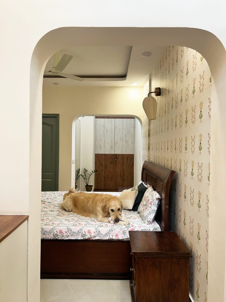 Bedroom entrance featuring a dramatic arched ceiling design in a Japandi-style Bangalore home